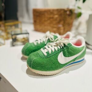 Green and White Nike Sneakers